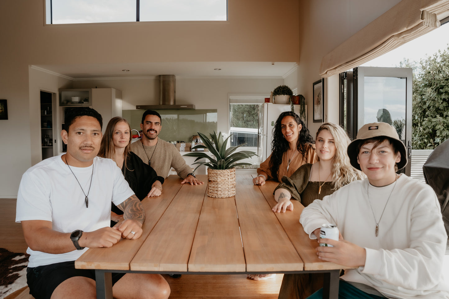 young men jewelery, nz fashion, nz jewelery, anxiety necklace, anxiety whistle, stress relief, wooden table, nz houses, maori jewelery, maori male, nz woman, ha habit, ha tool,