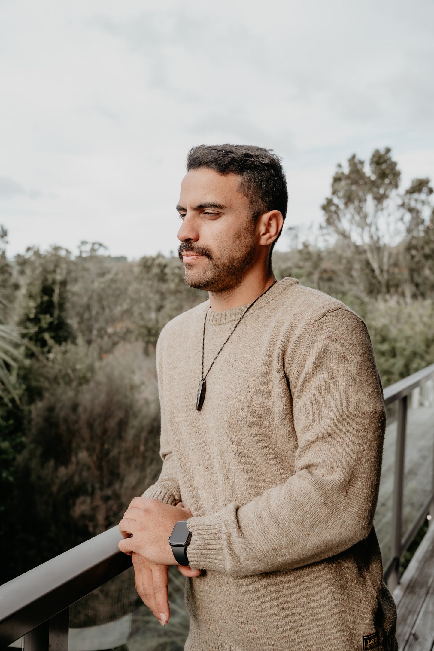 NZ male, Maori Male, black necklace, nz jewellery, breathing whistle, Hā tool, Ha tool, nz anxiety whistle, anxiety whistles