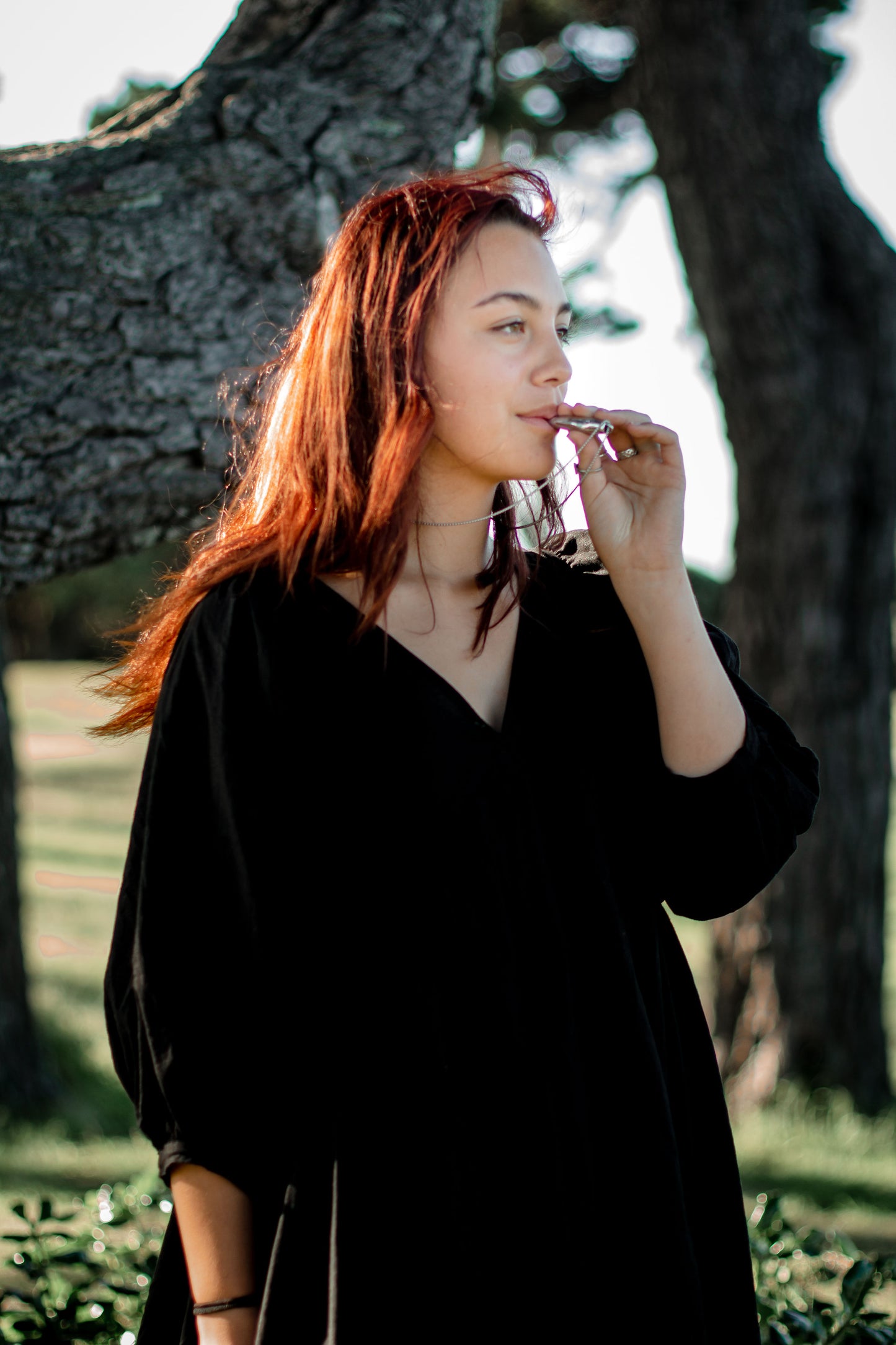 black loose dress nz, black dress nz, nz fashion, breathing tool, anxiety necklace, anxiety whistle, stress relief, nz beach, red hair, youth nz, hauroa, wellbeing nz